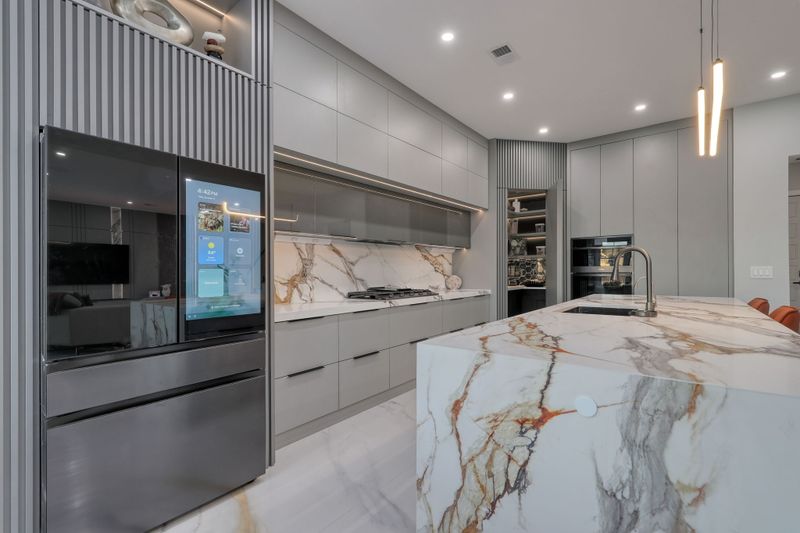Refined kitchen with custom cabinetry